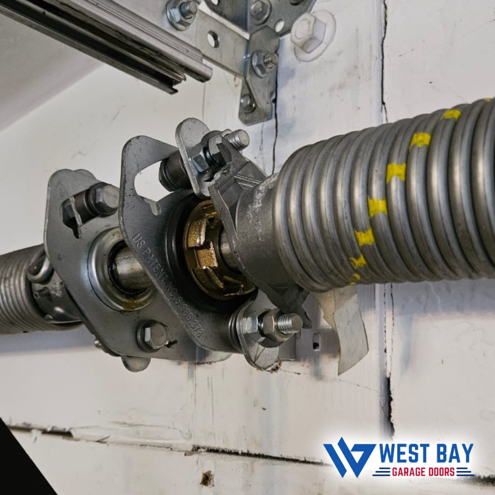 Broken garage door spring repair Houston TX